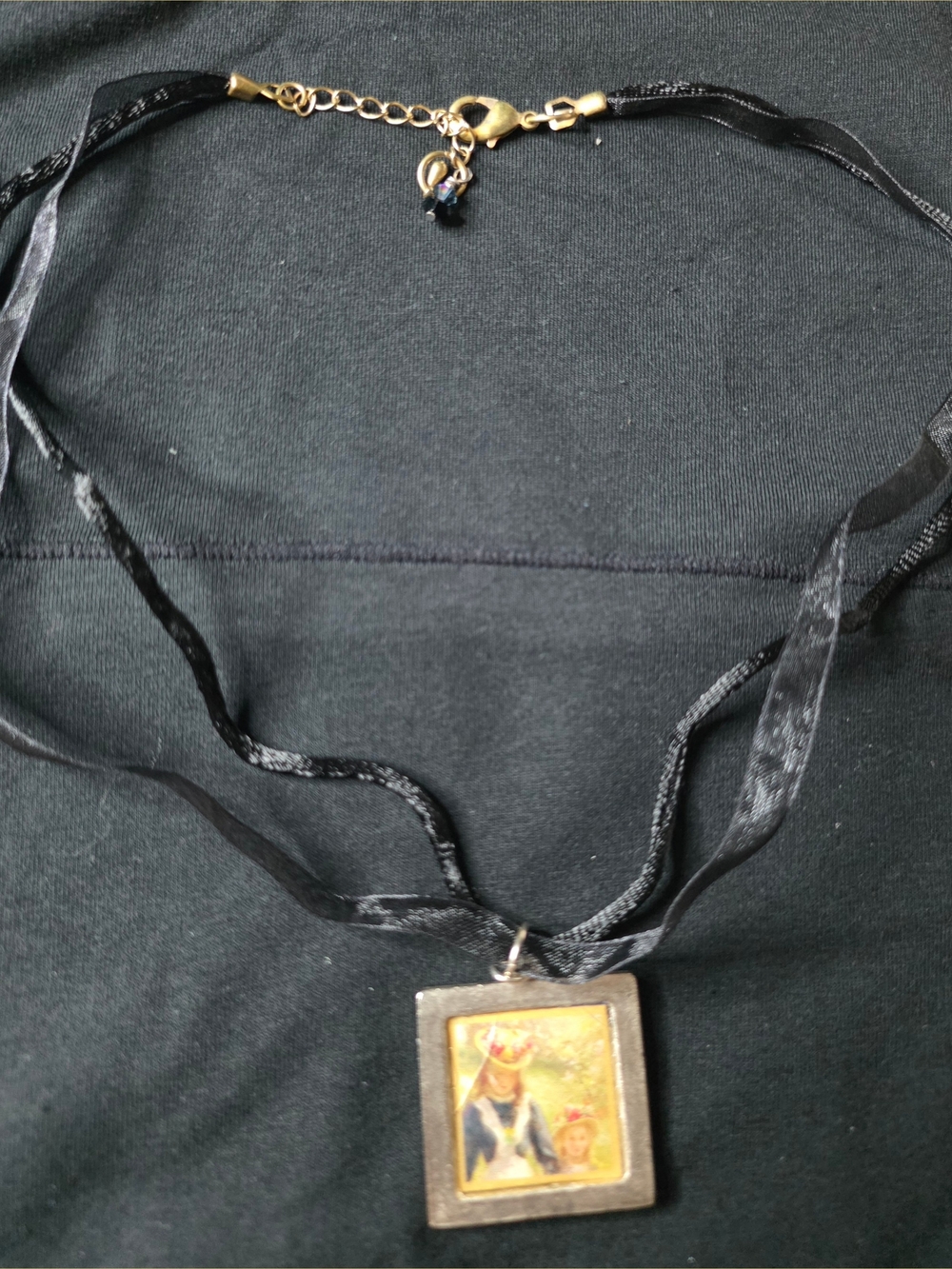 Black Ribbon Portrait Pendant Necklace with Gold-Tone Accents